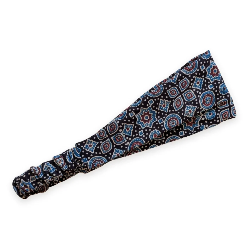 Bandeau cheveux en tissu noir et rouge motif médaillons
